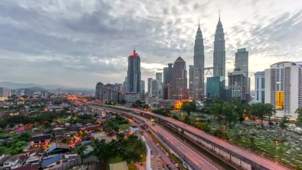 4k time lapse of dramatic sunrise at Kuala Lumpur city. Moving and changing color clouds. Aerial view. — Stock Video
