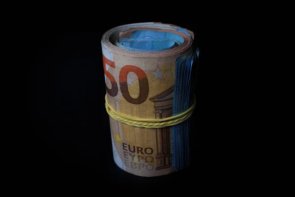 Rollo Billetes Euros Sobre Fondo Negro —  Fotos de Stock