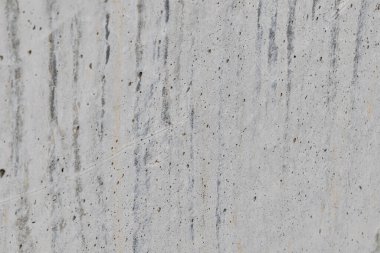 Açık gri arkaplan ve beton dokusu. Gri beton duvarın perspektif görüntüsü.