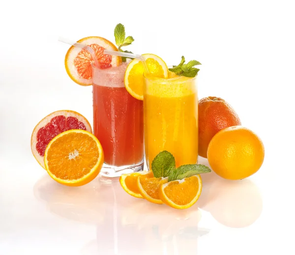 Φρέσκο χυμό πορτοκάλι και το γκρέιπφρουτ Φωτογραφία Αρχείου