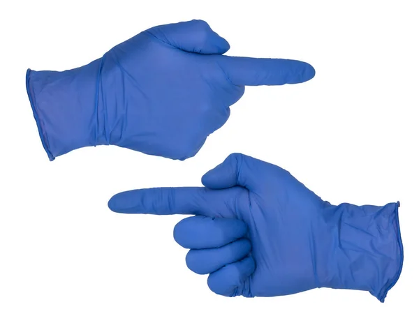 手戴蓝色硝酸铵检查手套 做一个指向左或右的手势 把大拇指塞进去 — 图库照片