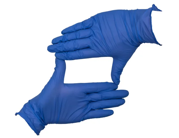 戴蓝色硝酸铵检验手套的手 使拇指和食指之间有一个正方形或长方形的框架 手指闭合在一起 — 图库照片
