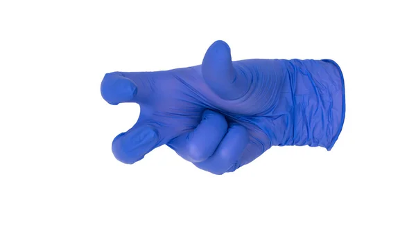 Mavi nitrile eldiveni takmak lokal anestezi jesti yapar. Dermatolojik ameliyat için sözel olmayan el işareti