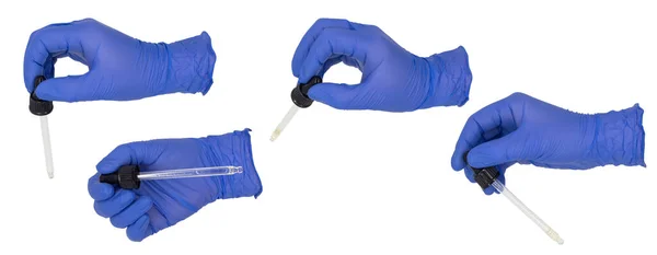 Mavi nitrile muayene eldiveni giymiş bir kadının elinde çeşitli pozlarda pipet var. Beyaz bir arka planda izole edilmiş. Deri Yok