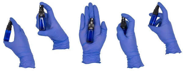 女用手戴着蓝色的硝酸铵检查手套 手持一个小玻璃瓶 姿势各异 被白色的背景隔离了没有皮肤 — 图库照片