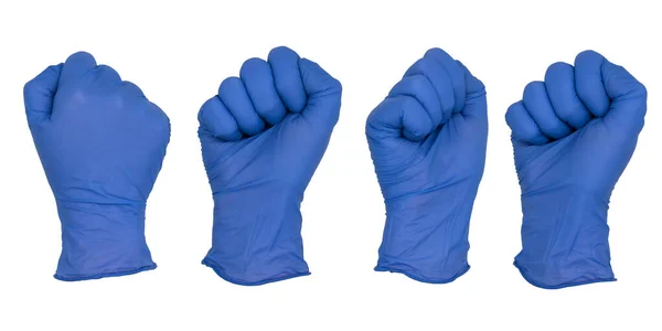 手戴蓝色的硝酸铵检查手套 手握拳头 各种角度 免版税图库照片
