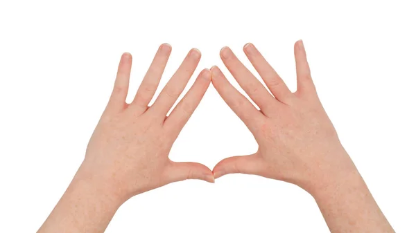 雀斑斑斑的白手 用手指在拇指和食指之间做一个菱形或风筝架 手心朝下 女性手被隔离 图库图片