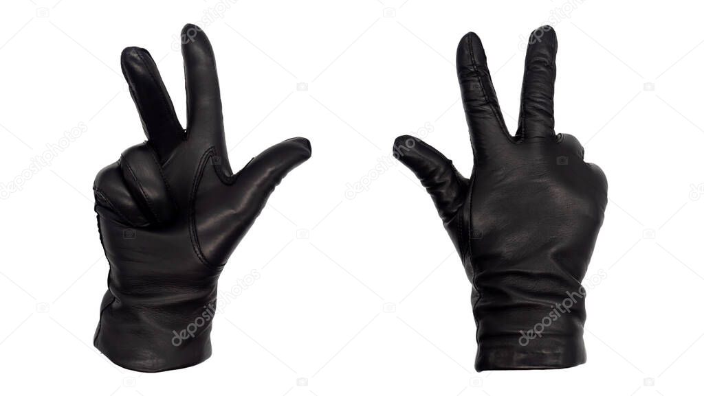 Hands wearing black leather gloves with thumb, index, and middle fingers raised, view from front and back.  Female hand isolated, no skin