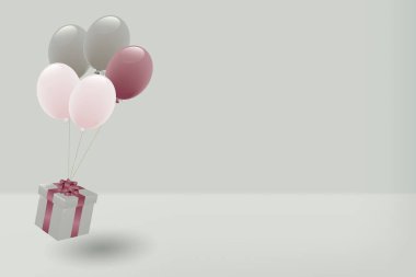 Sıkıcı renkli balonlar ve şimdiki kutu