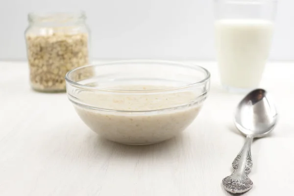 Gachas Avena Cocidas Con Leche Vaso Leche Una Cuchara Plato —  Fotos de Stock