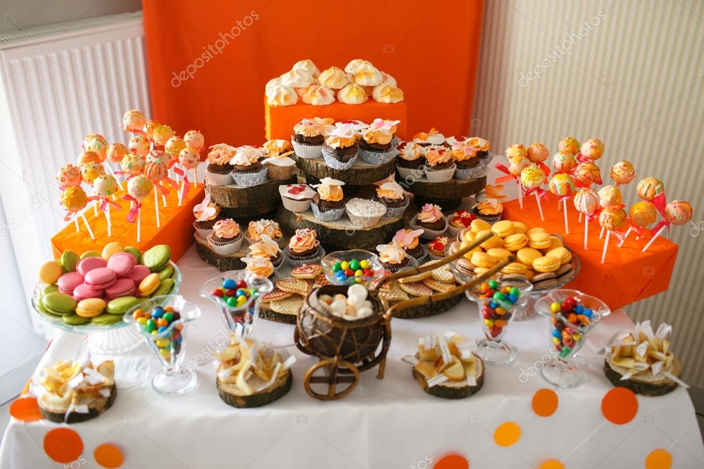 Decorated orange candy bar Stock Photo by ©ivash 100572978