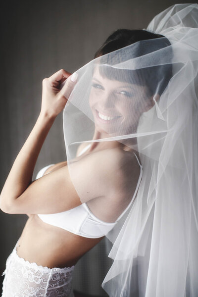 smiling bride in whiteness