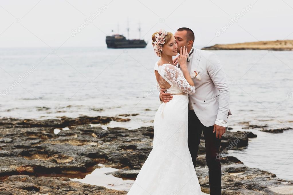 gorgeous blonde bride and stylish groom