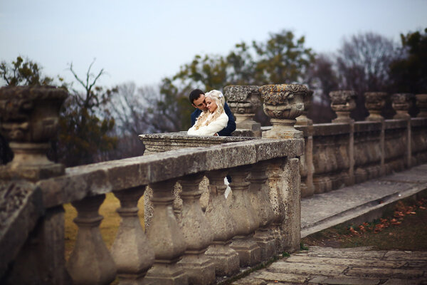 brunette groom and blonde bride