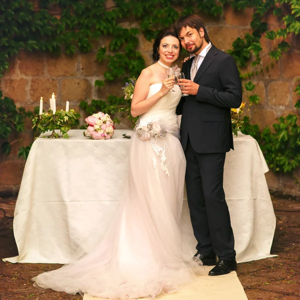 bride and groom smiling