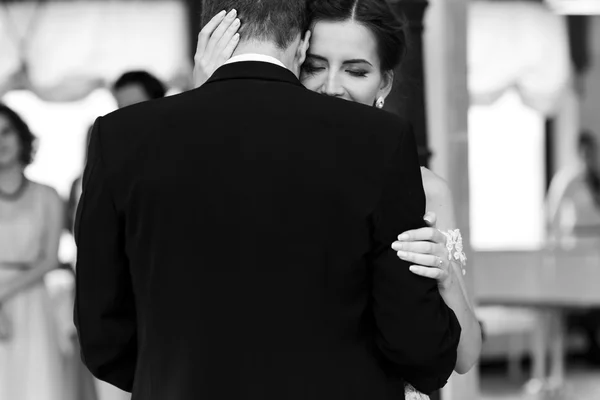 Happy newlywed bride and groom dancing — Stock Photo, Image