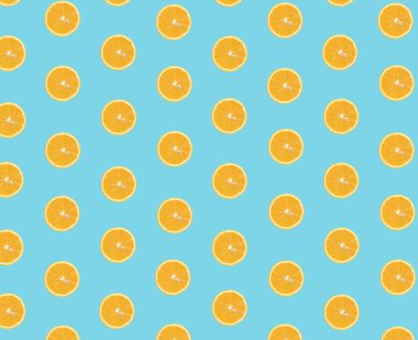 Pastel mavi arka planda ikiye bölünmüş taze limon deseni. Düz yatıyordu.