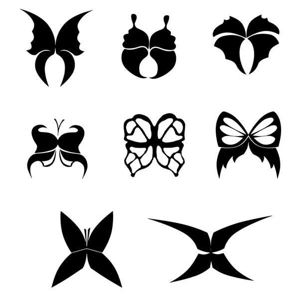 Set of black silhouettes of butterflies on a white background — Stock Vector