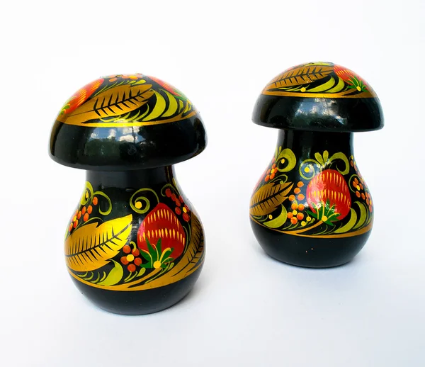 Two wooden mushrooms Khokhloma. — Stock Image Two wooden mushrooms Khokhloma. Royalty Free Stock Photos
