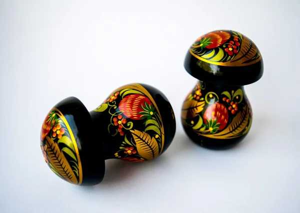 Two wooden mushrooms Khokhloma. — Stock Image Two wooden mushrooms Khokhloma. Royalty Free Stock Photos