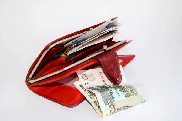Red leather purse with money. Royalty Free Stock Photos