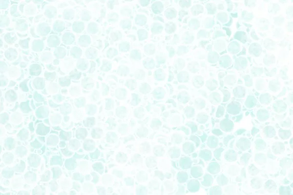 The background is light blue with many small circles, the cellular structures of the body