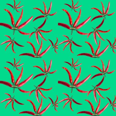 Kırmızı biberli kusursuz bir arka plan. Yeşil üzerine izole edilmiş acı biber. Chili biberler kapanıyor. Popüler sanat arka planı, baskılar ya da posterler için.