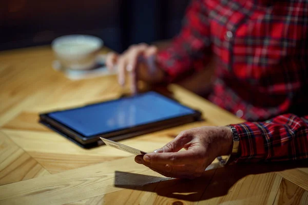 Mature Woman Makes Online Purchases Using Tablet Computer Cafe Older — ストック写真