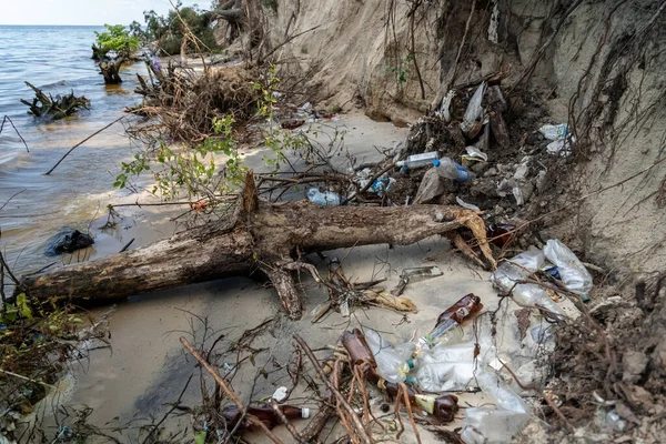 People and ecology. Riverside pollution. Trash and plastics at the beach. Human pollution of nature. Waste and plastic garbage on banks of dnieper river in Ukraine. Pollution of Kiev sea