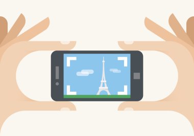 Paris Eyfel Kulesi 'nin fotoğrafını çekiyorum. Mobil akıllı telefon kamerası. fotoğraf paylaşım hizmetleri (Instagram), insanlar seyahat, turizm, tatil, ünlü güzel yerler, şehir simgeleri, fotoğrafçılar, blog kavramları