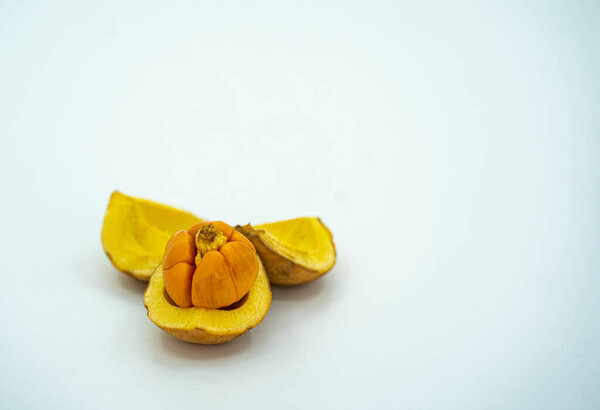 Local fruit called buah tampoi or Baccaurea macrocarpa. native to South East Asia. Selective focus points. Blurred background