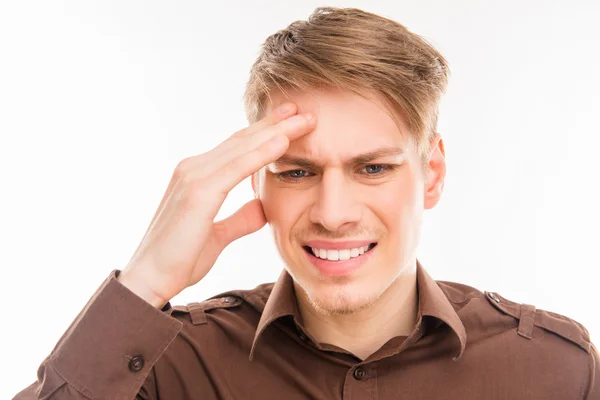 Attractive young man suffering of strong migraine — Stock Photo, Image