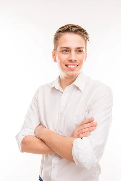 Young attractive businessman posing with crossed hands — Stock Photo, Image