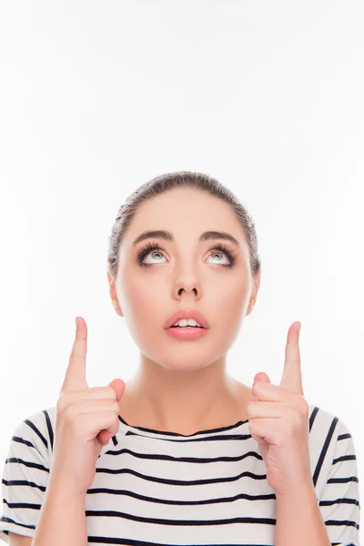 Portrait de fille animée pointant vers le haut avec la bouche ouverte — Photo