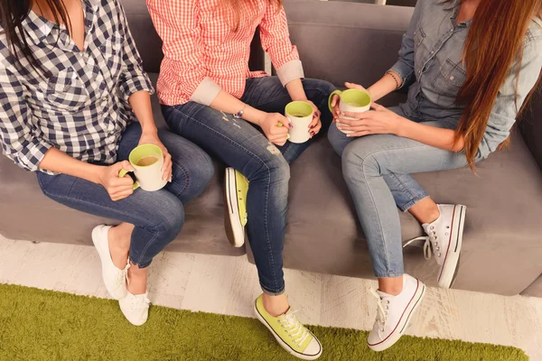 Close up, top view photo of three women sitting on couch with cu — Stock Photo, Image