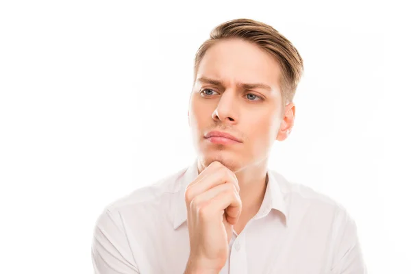 Portrait of serious minded man touhing his chin — Stock Photo, Image