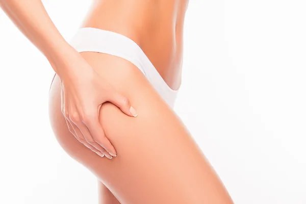 Closeup photo of young woman making an anticellulitis massage fo — Stock Photo, Image