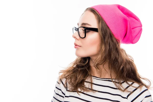 Side view portrait of cute girl in pink hat and glasses — Stock Photo, Image