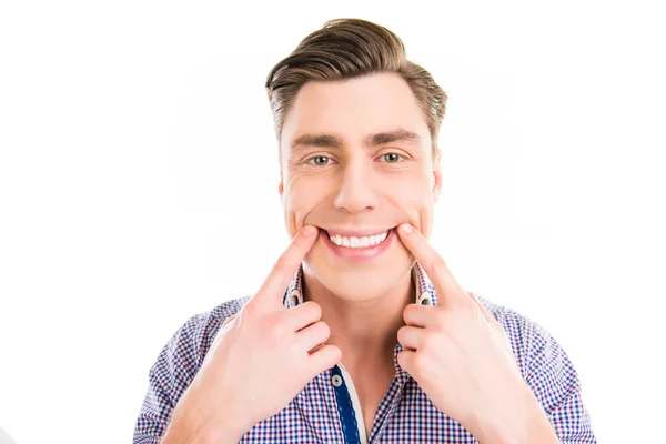 Portrait of happy young man posing with streched smile — Stock Photo, Image