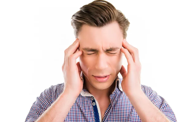 Young sad businessman with big problems touching his head — Stock Photo, Image