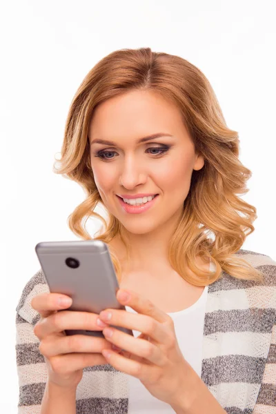 Close up portrait of cute girl with curly hair  holding smartpho Royalty Free Stock Images