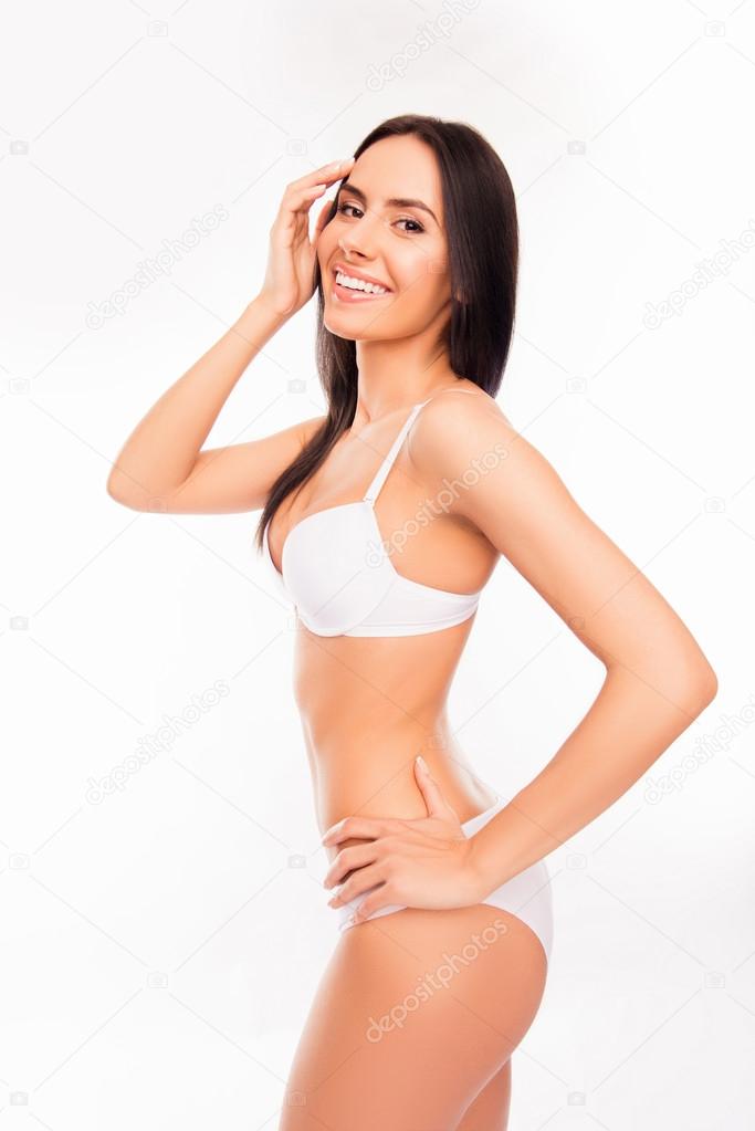Slim woman wearing panties and bra standing - Stock Photo [49348142] -  PIXTA
