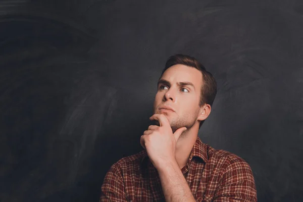 Portrait of ponder man on the background of chalkboard — Stock Photo, Image