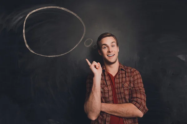 Handsome happy young man thinking about solving problem — Stock Photo, Image