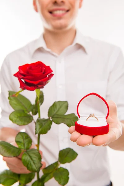 Close up portrait of man with rose and wedding ring going to mak — Stock Photo, Image