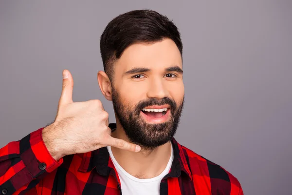 Handsome bearded young man asking to call him — Stock Photo, Image