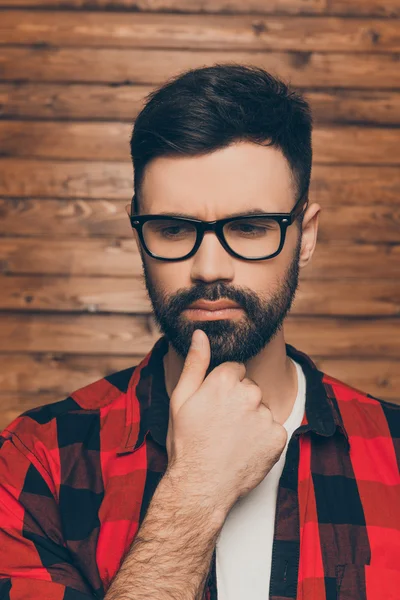 Close up portrait of minded serious man in  spectakles touching — Stock Photo, Image