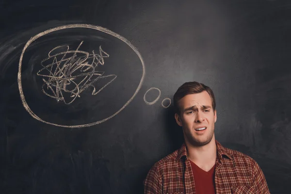 Portrait of sad man at loss with grimace on his face — Stock Photo, Image