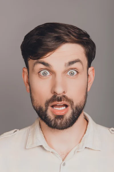 Portrait of shocked young guy with open mouth — Stock Photo, Image