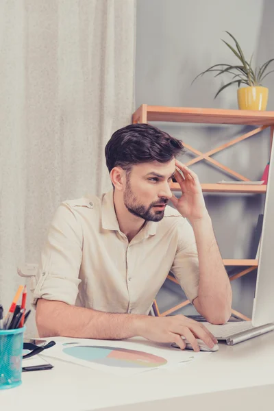 Tired handsome man having hard day in office — Stock Photo, Image